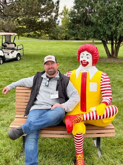 Volunteer Rick Bloniarz with Eastern Shipping Strikes a Pose with Ronald McDonald